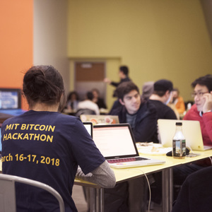 A hacker working late night at MIT Bitcoin hackathon during MIT's bitcoin Expo which took place the weekend of Mar. 17 - 18 at MIT