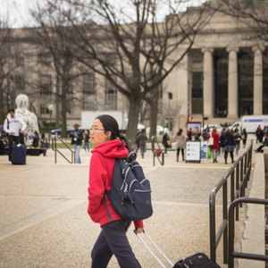 Prefrosh Julia Park finds her way in front of the student center and building 7 Thursday during MIT's annual Campus Preview Weekend, which runs April 12ñApril 15 this year
